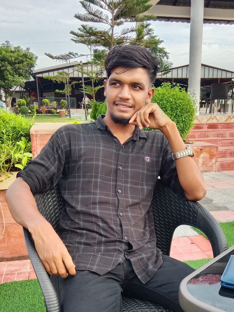 Gazi Masud sits on the chair